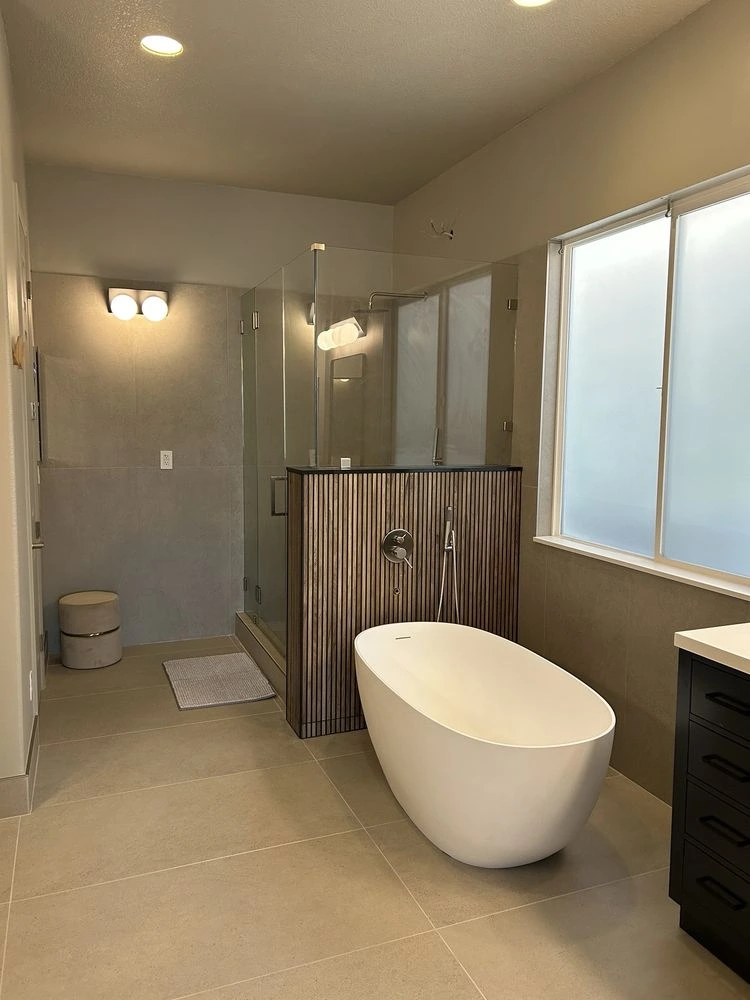 Dated beige floor tiles in an older bathroom vanity area showing a before-renovation condition